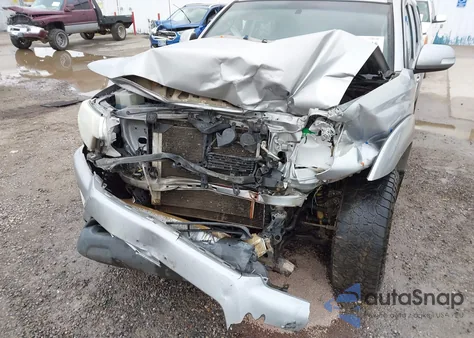 2015 Toyota Tacoma Base V6 z USA, uszkodzony, nr VIN 3TMMU4FN4FM075340